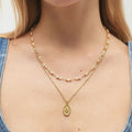 Collana perline e pendente
