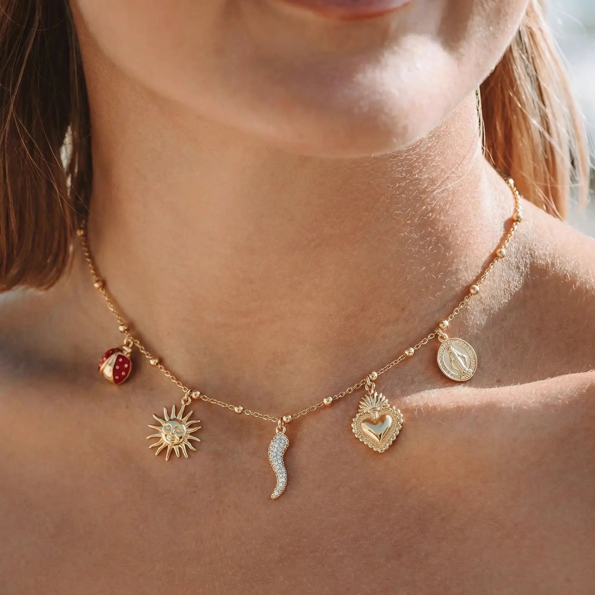 Collana dorato con charm Rinascita