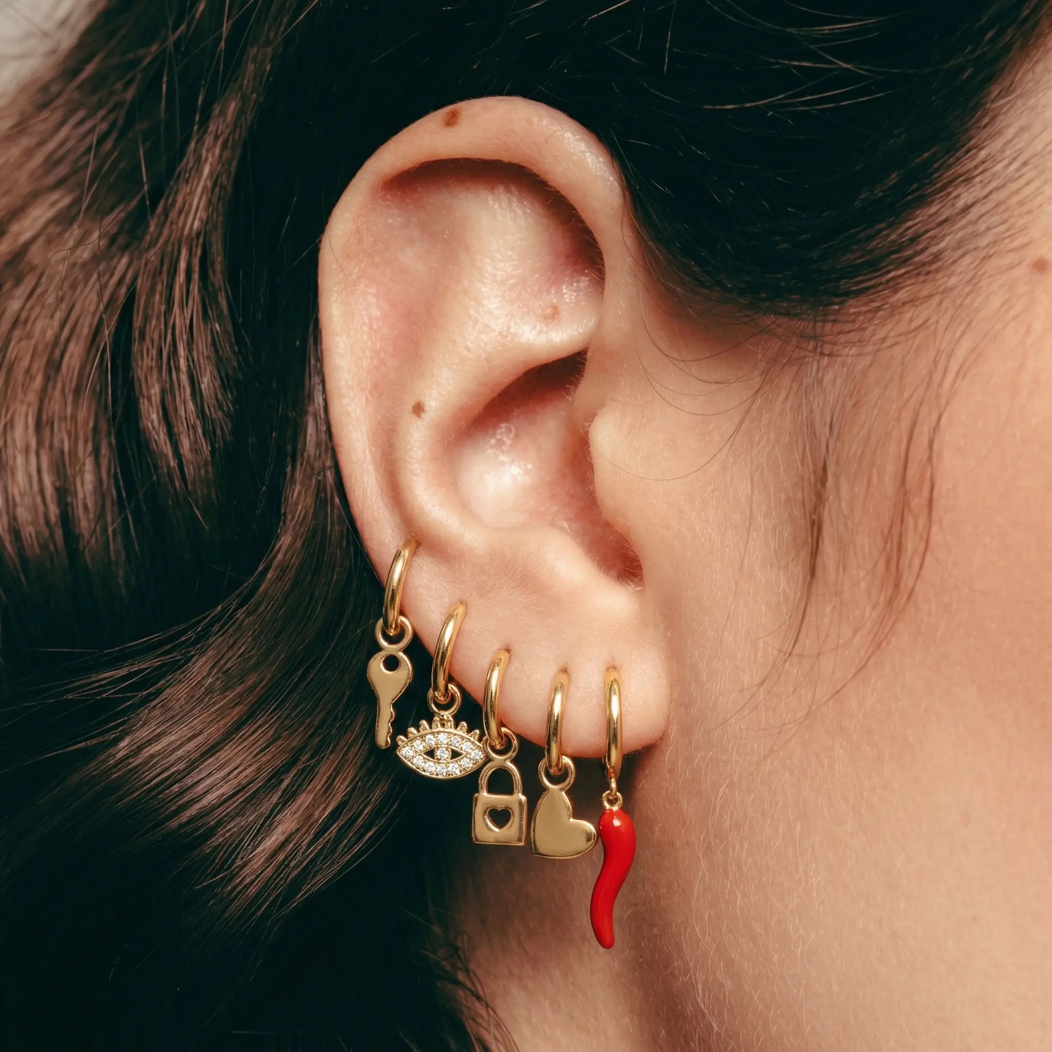 Orecchini dorato con charm (6pz)